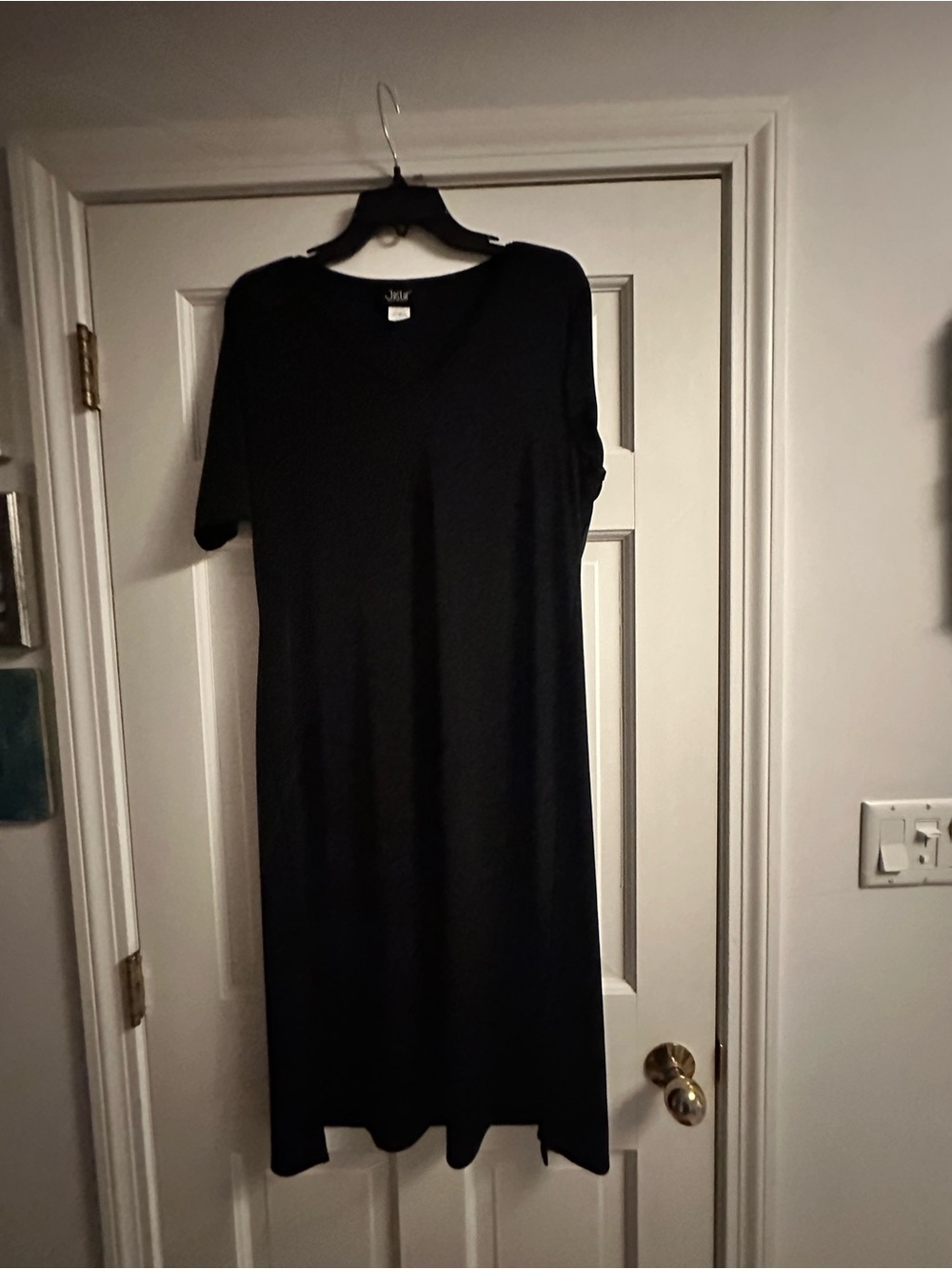 Women’s Black Short-Sleeve V-Neck Dress
Everyone needs a little black dress